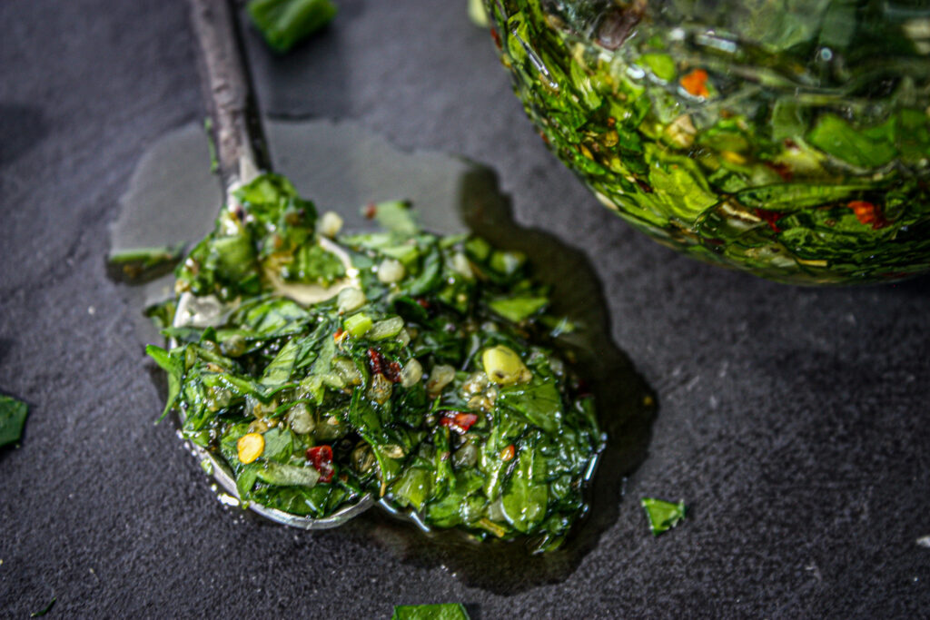 spoon of chimichurri and spices