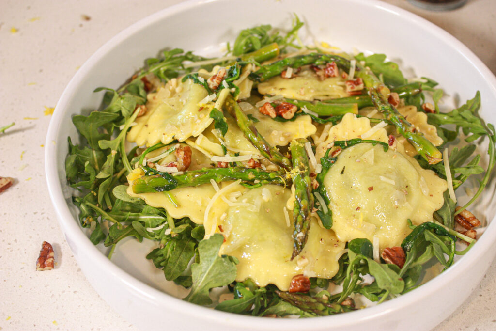 vegan ravioli with asparagus and lemon sauce